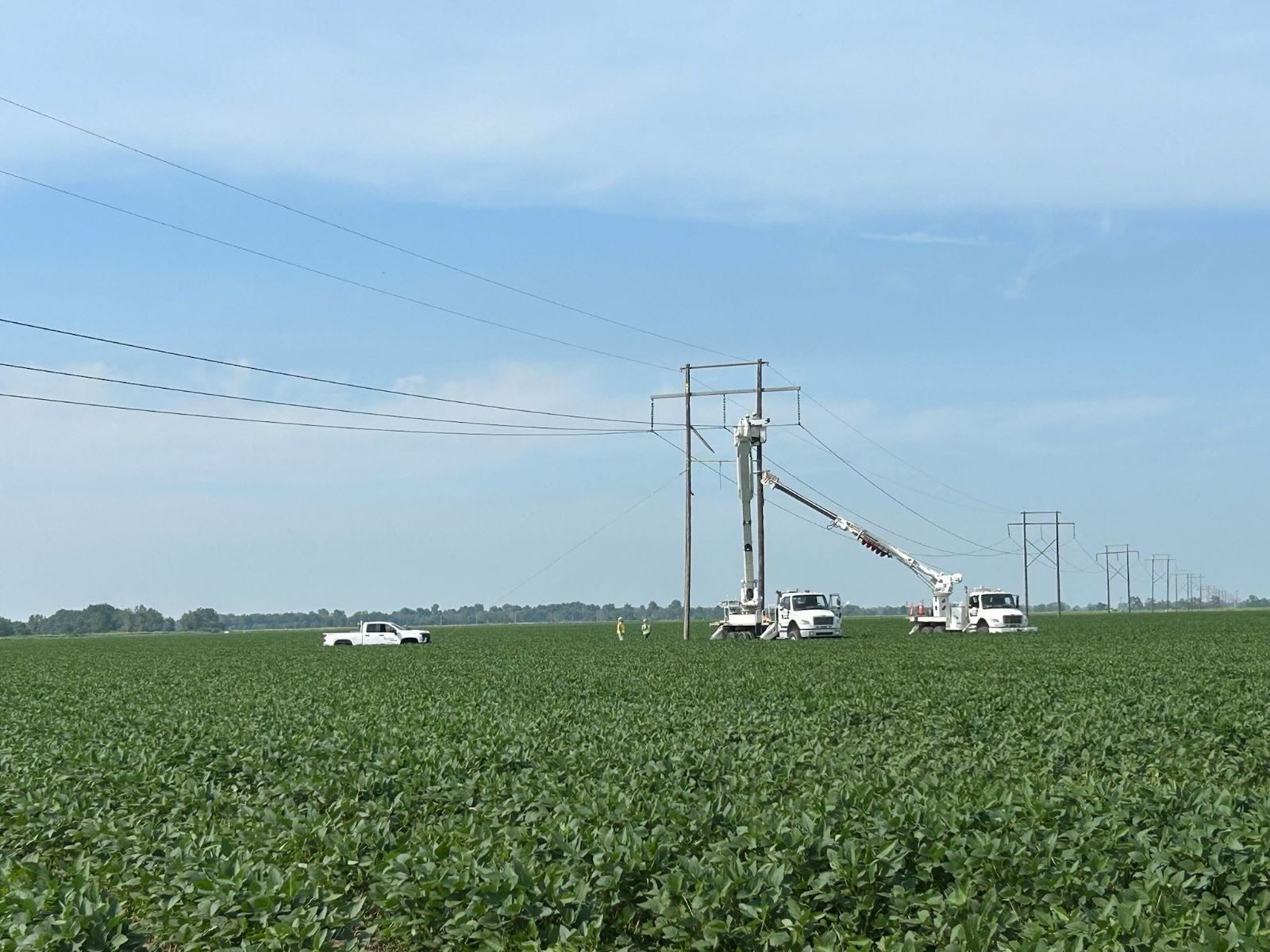 Crews restore transmission lines structures damaged near Lepanto.